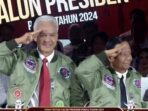 Debat Capres, Ganjar – Mahfud Beri Hormat Tiga Jari
