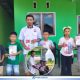 HMC Salurkan Buku dan Alat Tulis untuk Pelajar di Desa Sukamaju